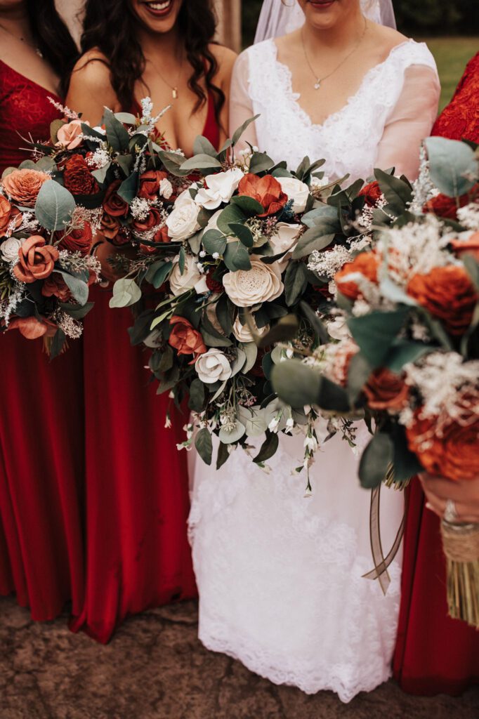 bride and brides holding bouquets